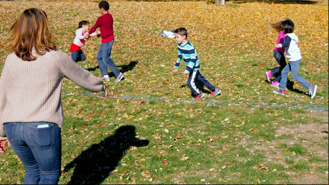 Kids and parent spin a
partner